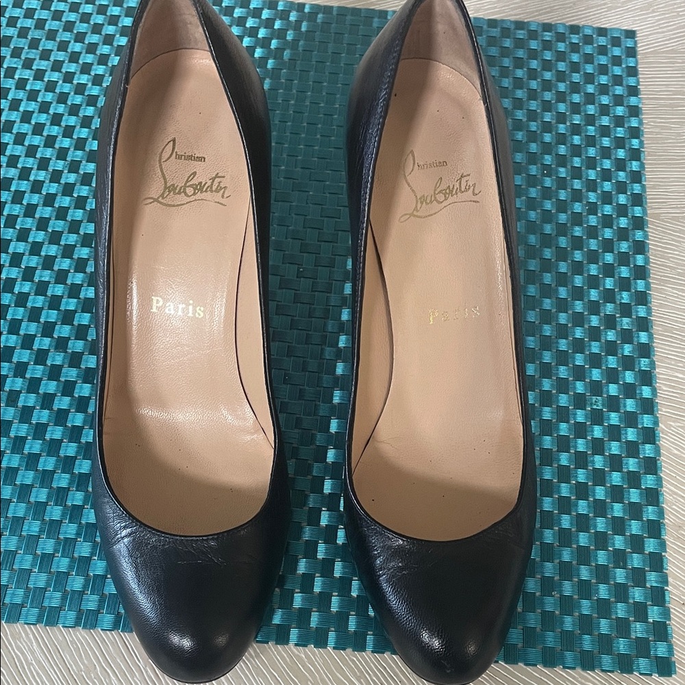 Christian Louboutin Classic Black Leather Pumps